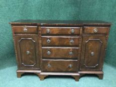 A small mahogany breakfront sideboard