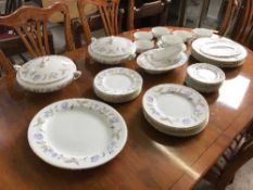A quantity of Royal Worcester Blue Poppy dinner ware