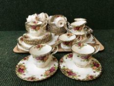 A tray of Royal Albert Old Country Roses tea china