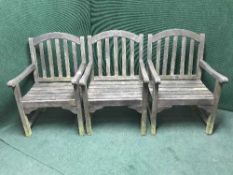 A two seater garden bench and three chairs