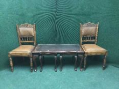 A mahogany nest of three tables and a pair of chairs