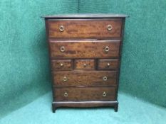 A Stag Minstrel seven drawer chest
