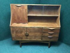 A teak cocktail sideboard