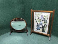 An oak tapestry fire screen and a dressing table mirror