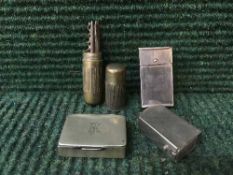 A miniature tool kit and two vesta cases