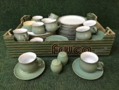 A box of Denby dinner ware