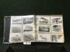 An album of monochrome photographic cards - Aircraft and military