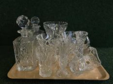 A tray of crystal and decanters