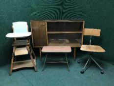 A teak cabinet, child's high chair,