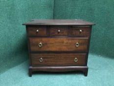 A Stag Minstrel five drawer chest