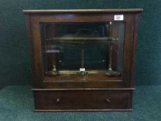 A mahogany cased set of scales stamped Knowles Patent Yarn Balance, Goodbrand & Co.
