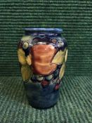 A blue glazed Moorcroft vase,