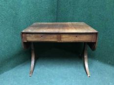 A Victorian mahogany drop leaf sofa table