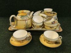 A Royal Doulton tea set decorated with coaching scenes