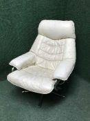 A cream leather swivel chair