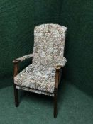 A tapestry seated armchair