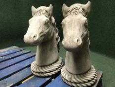 A garden figure - pair of horse heads