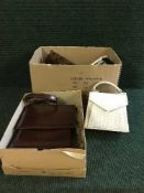 A box of lady's hand bags