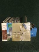 Two boxes of LP records and singles