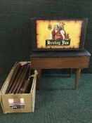 A teak sewing stool together with a plastic bottle crate and box of table legs