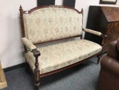 A late 19th century upholstered salon settee