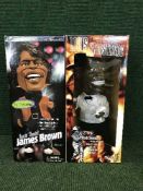 A boxed collector's edition Louis Armstrong animated figure and a James Brown boxed animated figure
