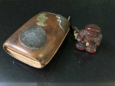 A Japanese inro with figural netsuke and octopus ojime,