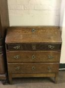A late 19th century oak bureau