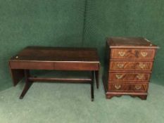 An inlaid mahogany drop end sofa table and an audio cabinet