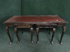 A nest of three tables