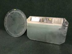 A circular Deco mirror and one other