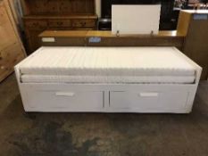 An Ikea Brimnes trundle bed