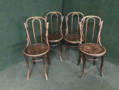 A set of four Bentwood kitchen chairs