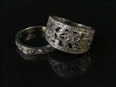 Two 18 carat white gold diamond set rings 9 grams