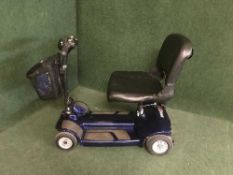 A Pride mobility scooter model Libre LX with charger and key