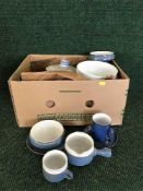 A box of Denby Colbalt blue dinner ware