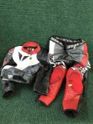 A set of teenagers motor bike leathers