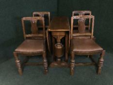 An eight piece oak dining room suite