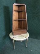 A set of mahogany corner shelves,