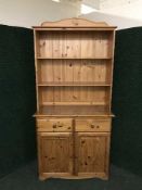 A pine double door kitchen dresser