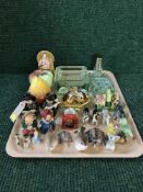 A tray of glass ash trays, assorted china cruets, Wade,