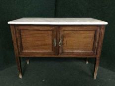 A Victorian inlaid mahogany marble topped wash stand