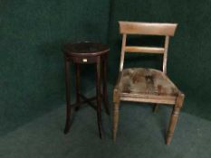 A late Victorian mahogany dining chair and a plant stand