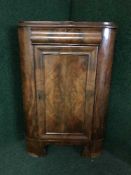 A late Victorian mahogany corner cabinet
