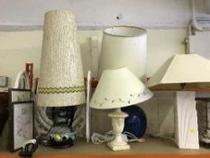 Two pottery table lamps, two other lamps,