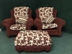 A red and cream floral print four piece lounge suite