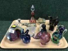 A tray of glass scent bottles, paperweights, animal ornaments,