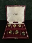 A set of six silver cased teaspoons