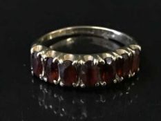 A 9ct gold and garnet ring