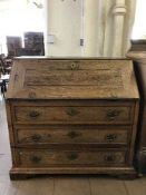 A late 19th century oak bureau